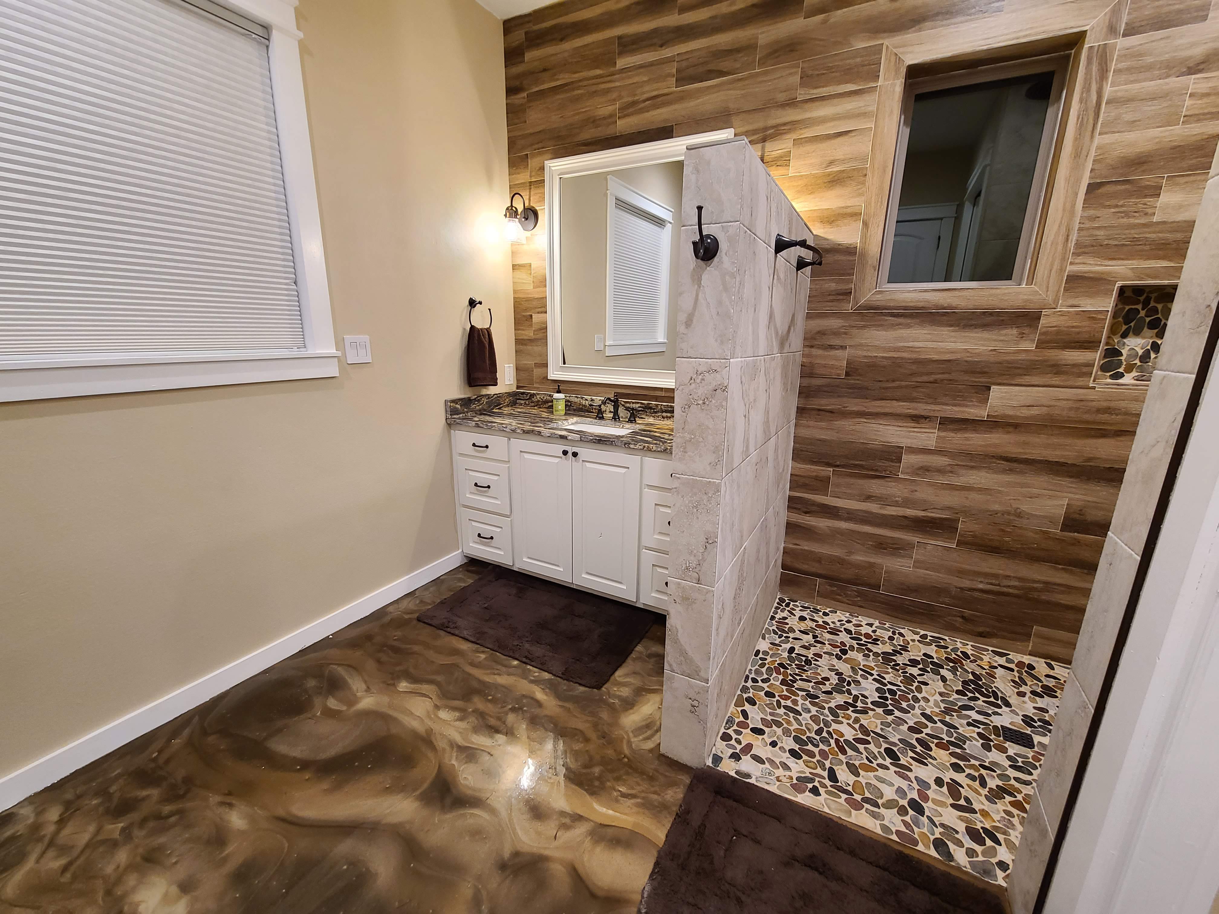 Pebble shower wood tile