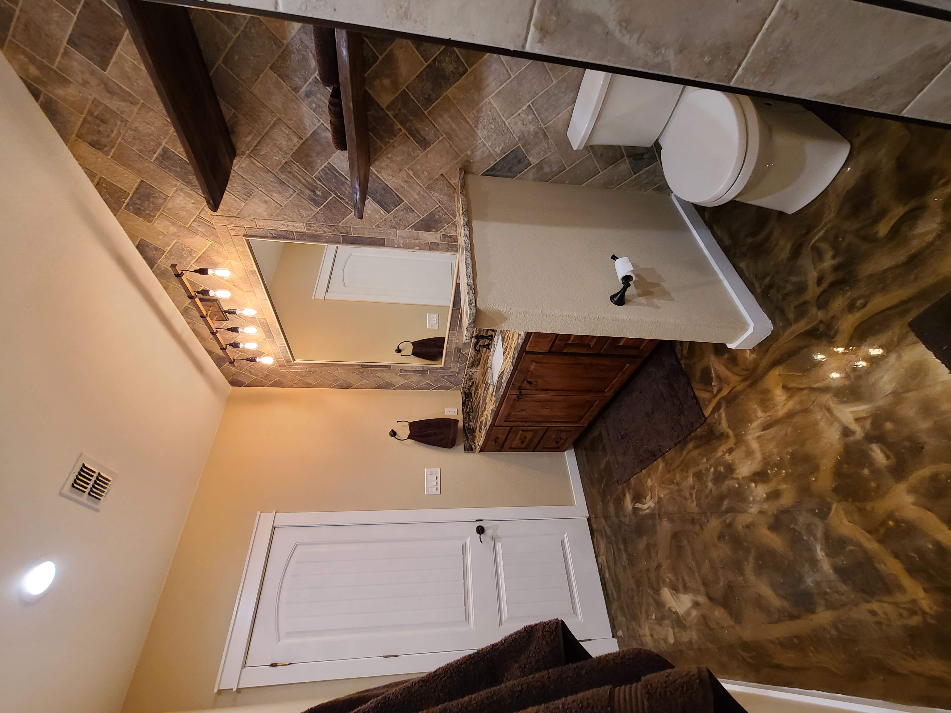 Alder vanity herringbone tile