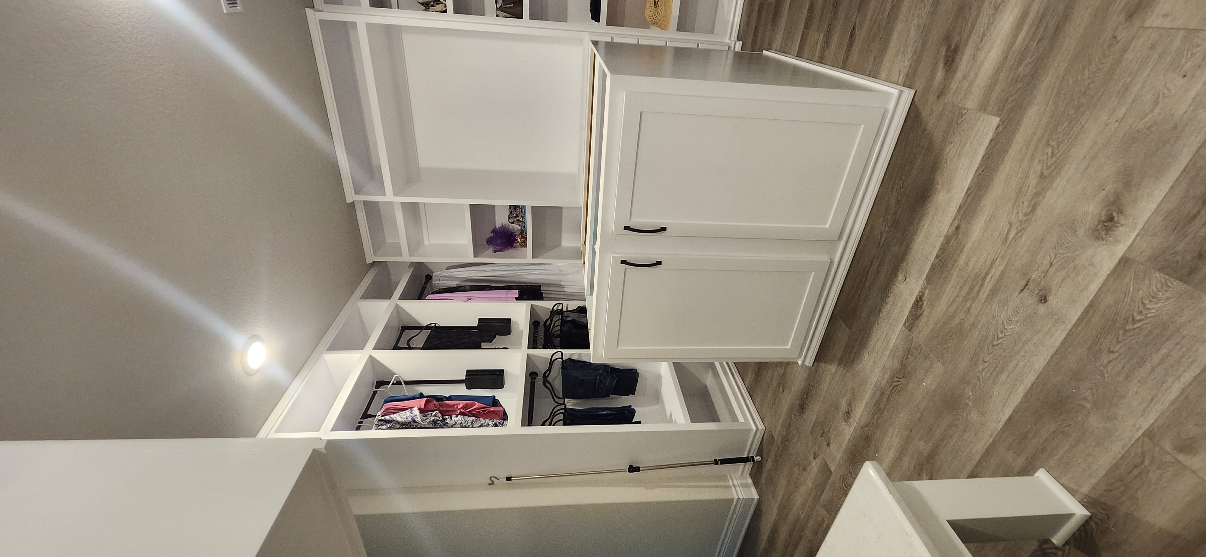 Walk-in closet island womens side